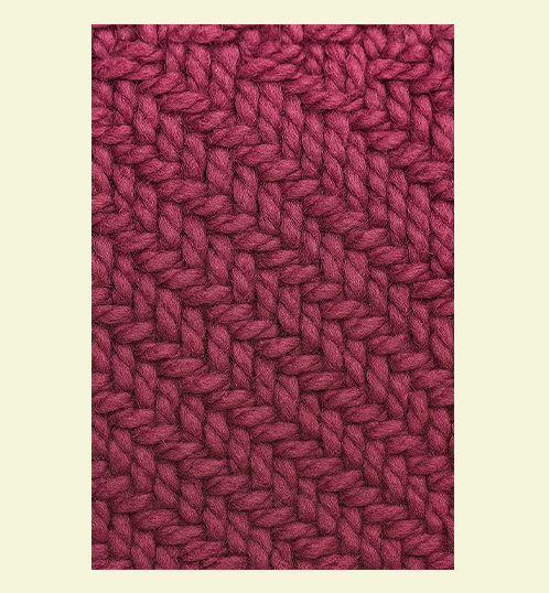 Close-up of a textured pink fabric pattern on a beige background