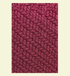 Close-up of a textured pink fabric pattern on a beige background