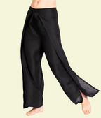 Black wide-leg pants on a beige background