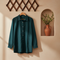Green shirt with collar on a beige background